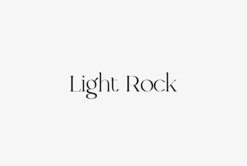 Light Rock serif font in thin elegant style on cream background
