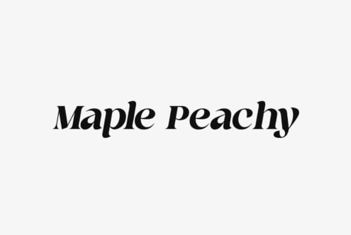 Maple Peachy serif font in black italic text on cream background