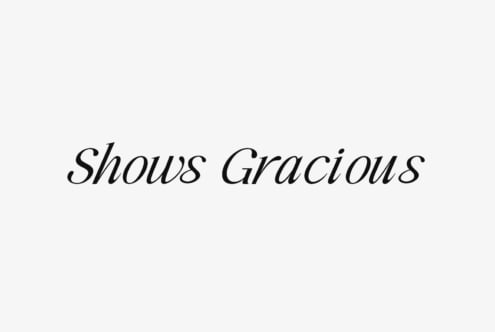 Shows Gracious italic serif font in elegant black lettering