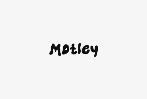 Motley wavy handwritten font in solid black on white background