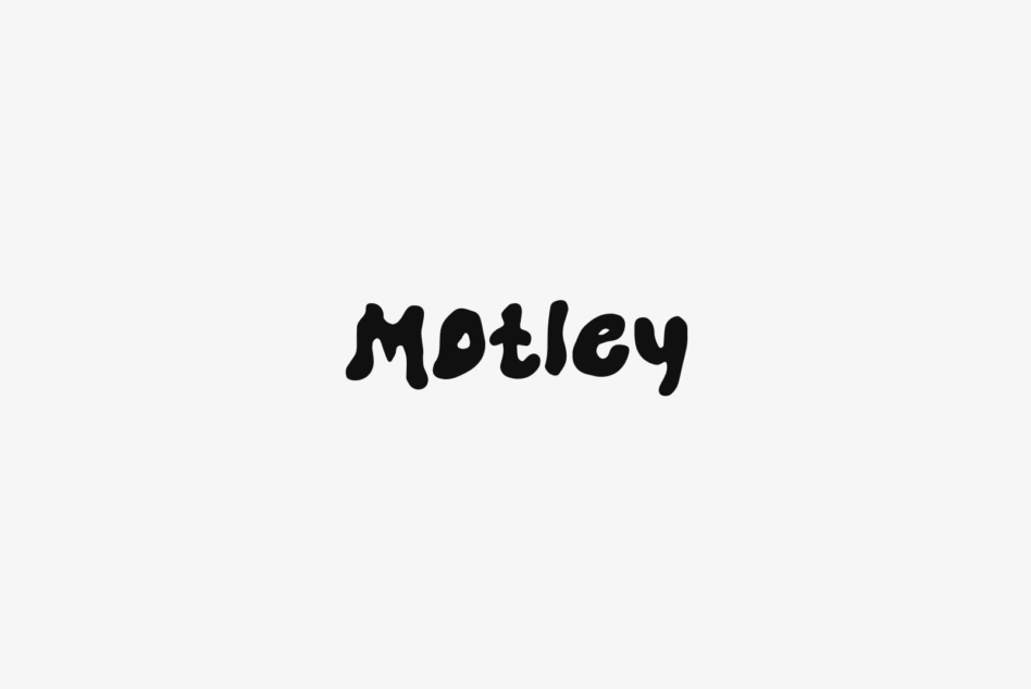 Motley wavy handwritten font in solid black on white background