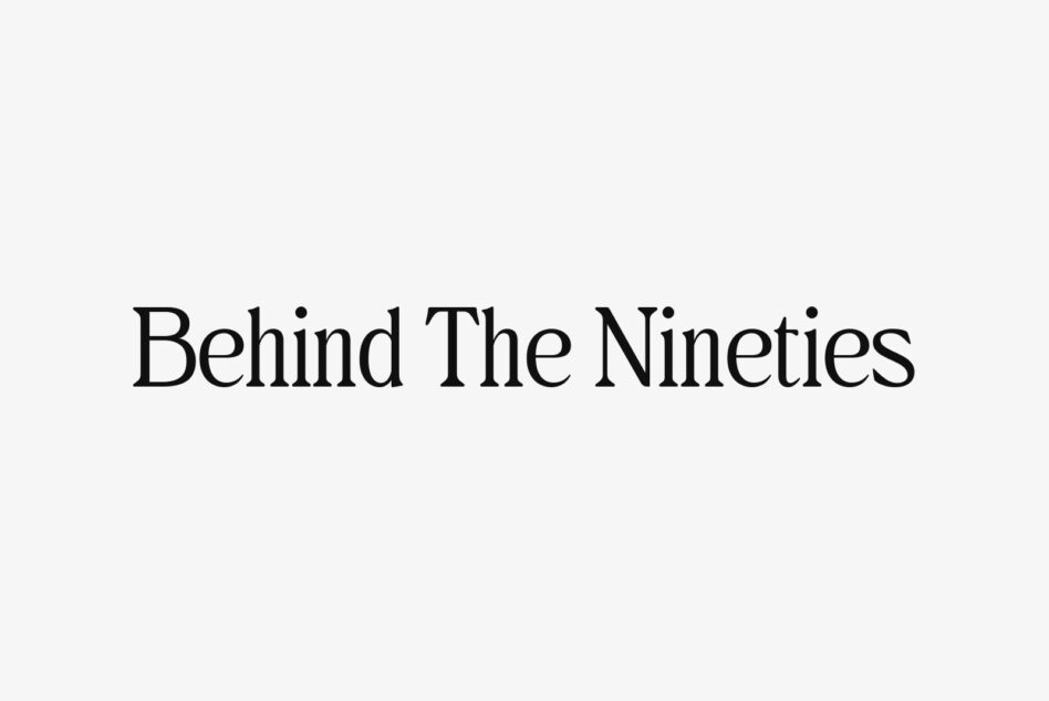 Behind The Nineties text in elegant serif font centered on light neutral background