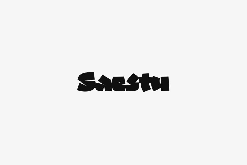 Bold distorted typeface with skewed letter forms on light background