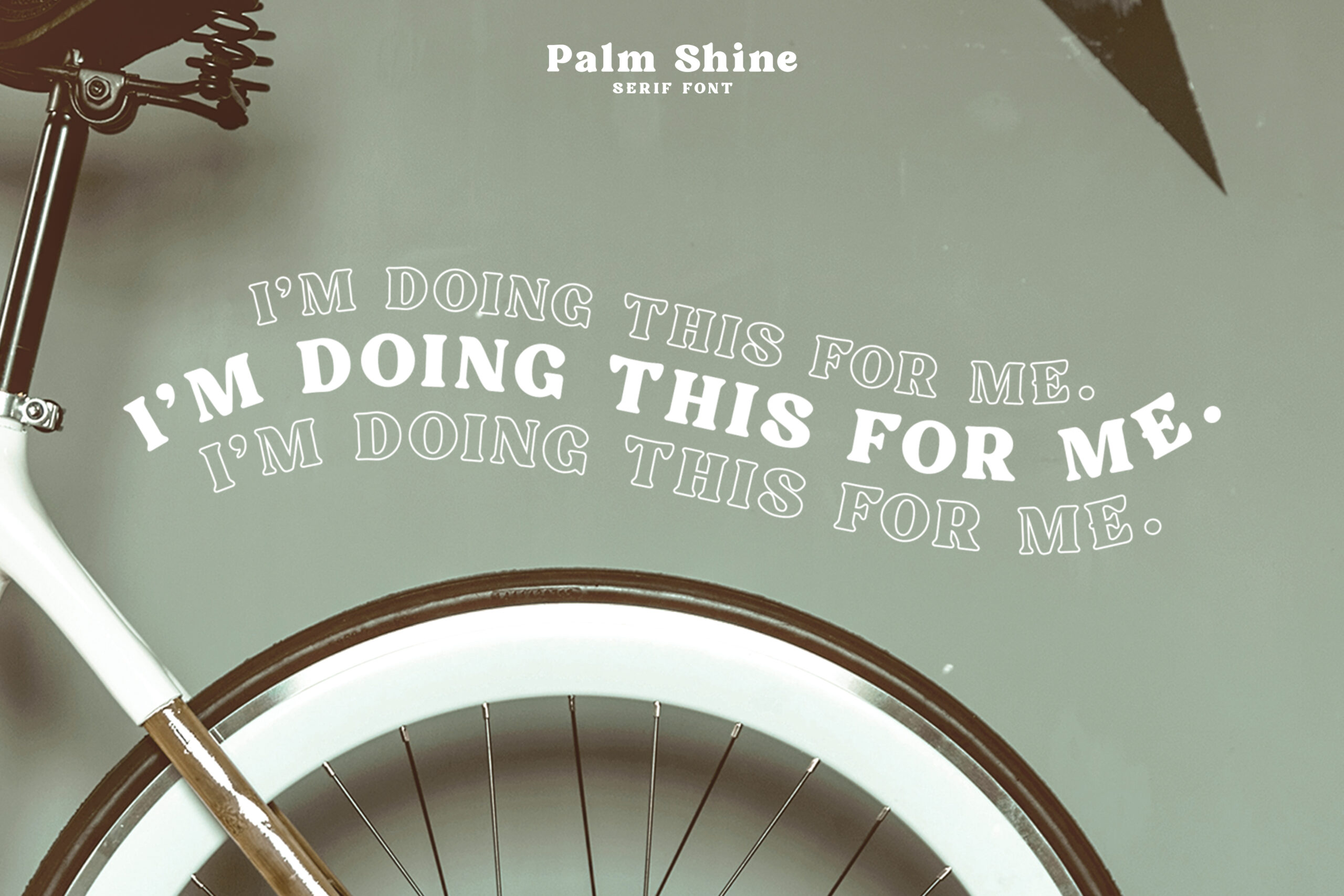I'm Doing This For Me text on vintage bike wheel, motivational quote overlay