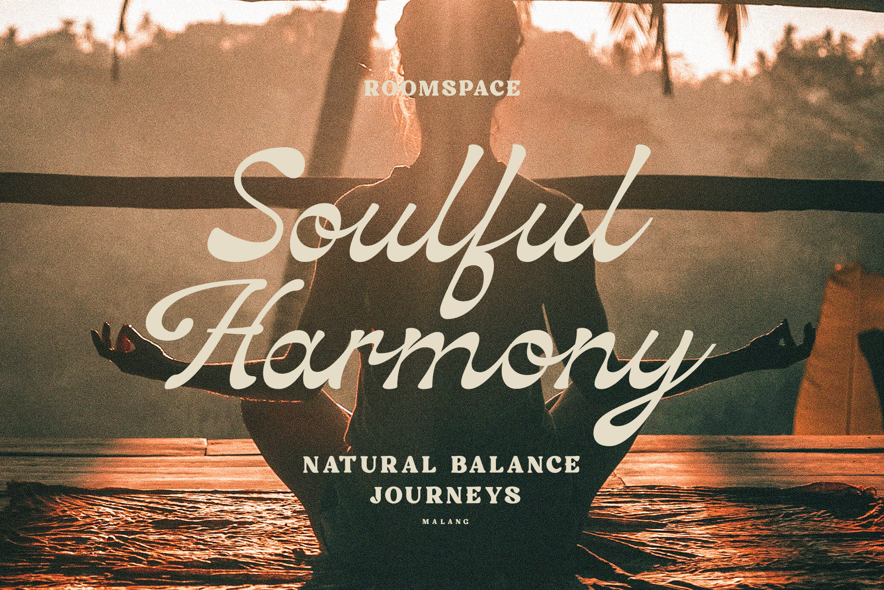 Soulful Harmony script font overlaid on silhouetted woman by sunset ocean