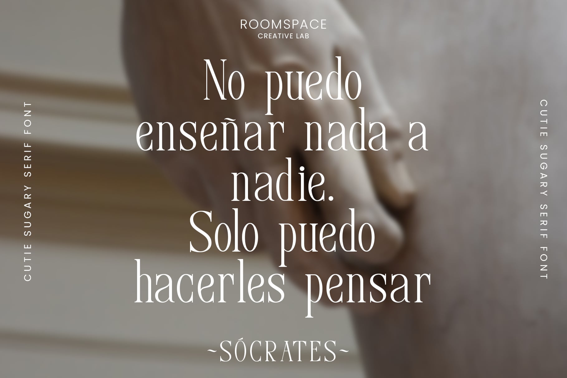 Spanish quote overlay on blurred hands with Cutie Sugary Serif font