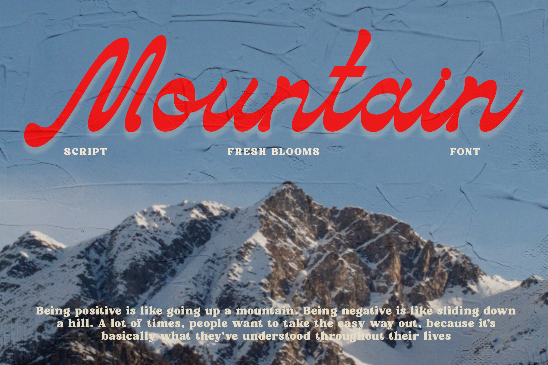 Red Mountain italic script font displayed over snowy peaks landscape