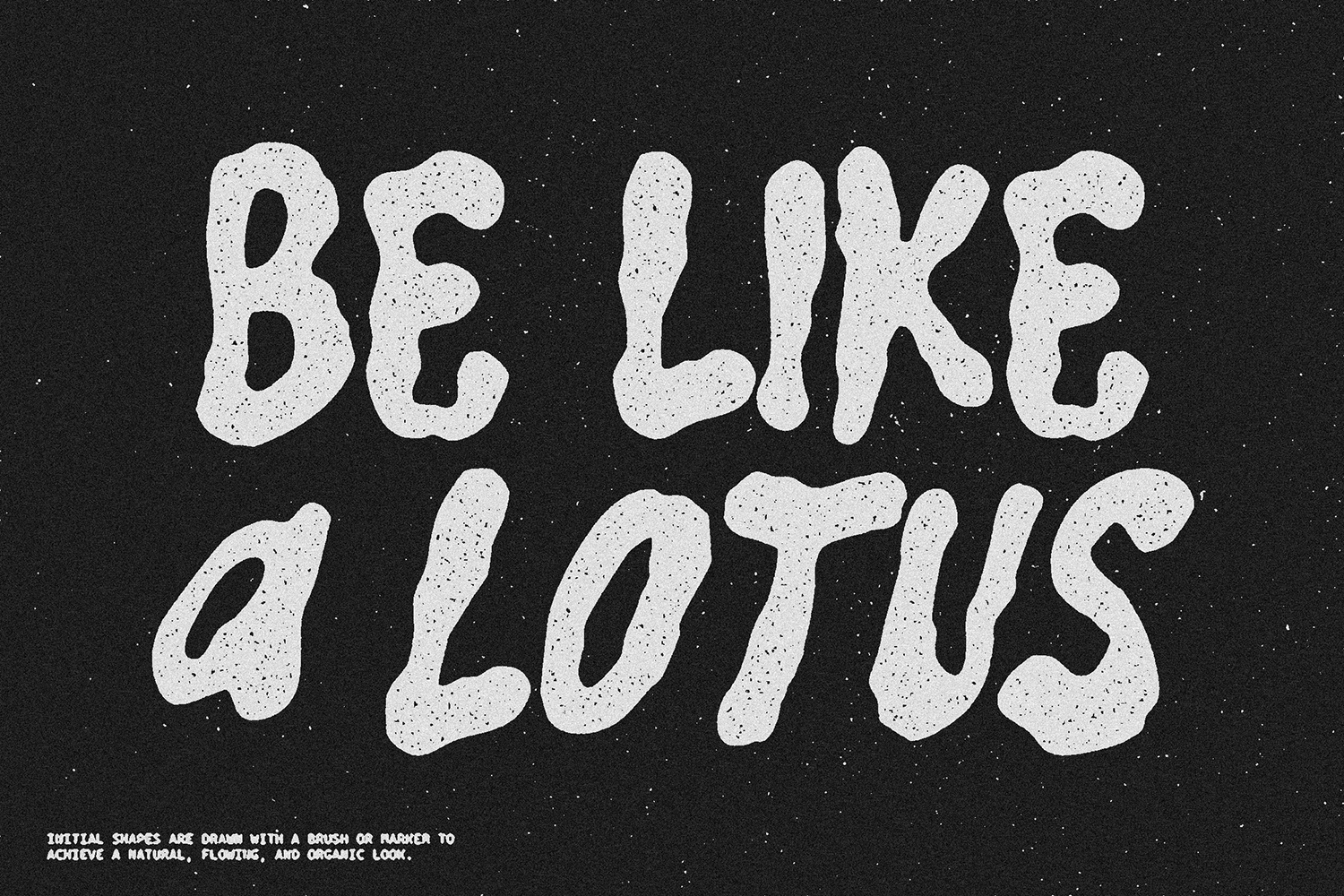 Chunky speckled typeface with organic wavy letterforms on dark starry background
