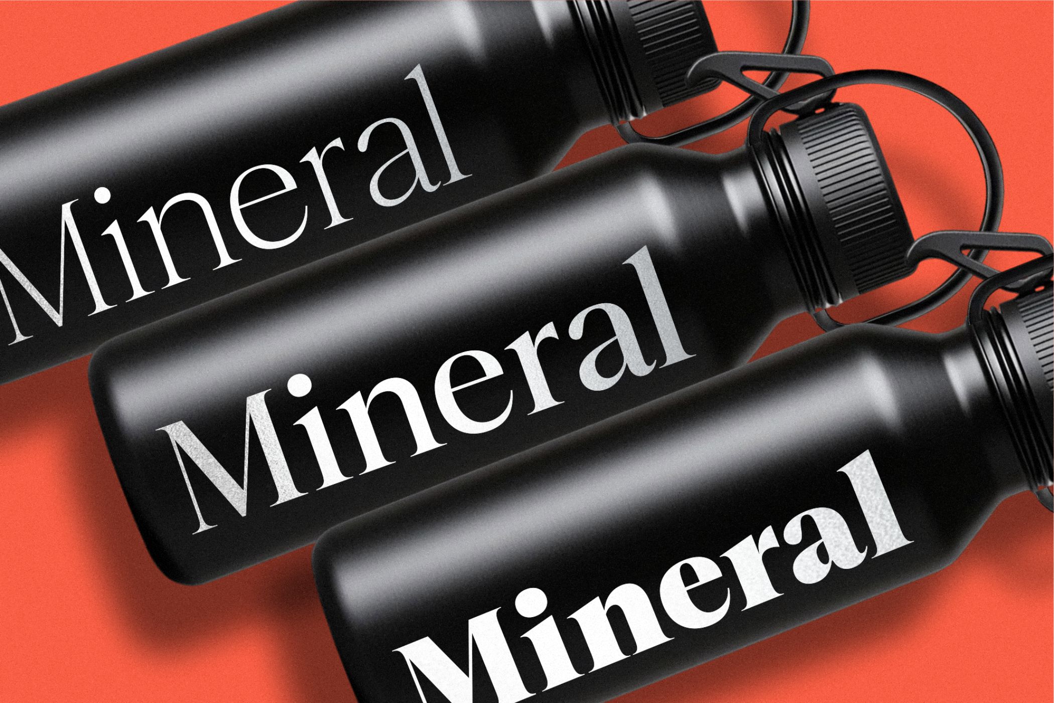 Mineral serif font displayed on black spray bottles with orange background