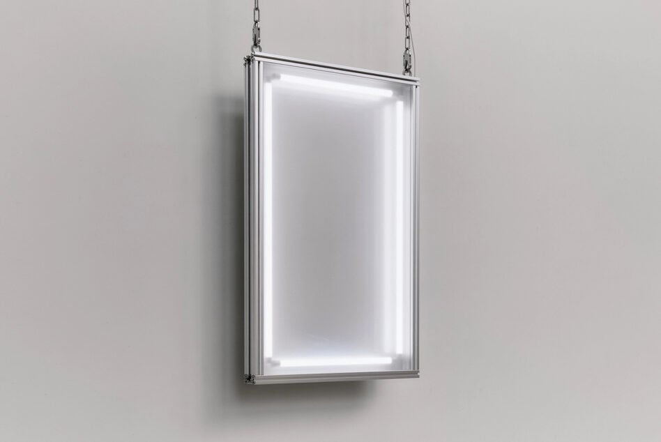 Hanging lightbox mockup with chrome frame showing glowing white interior on neutral background
