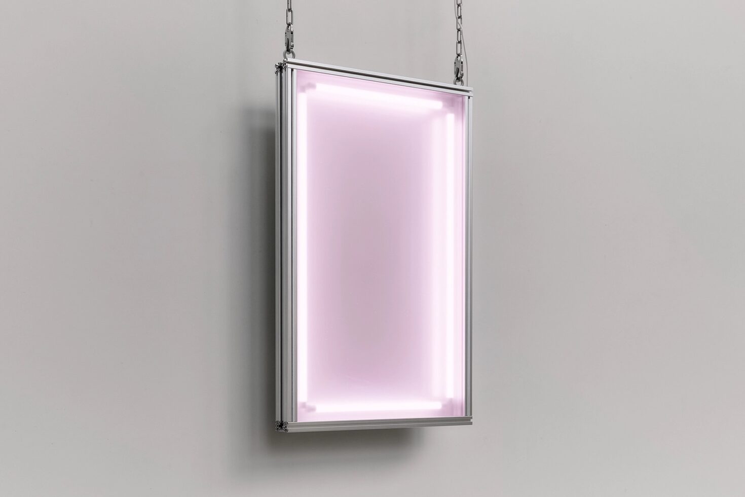 Hanging lightbox mockup with soft pink neon glow on neutral backdrop