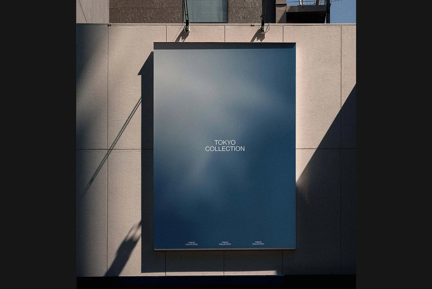 Hanging poster mockup with blue gradient backdrop on concrete wall with hard shadows
