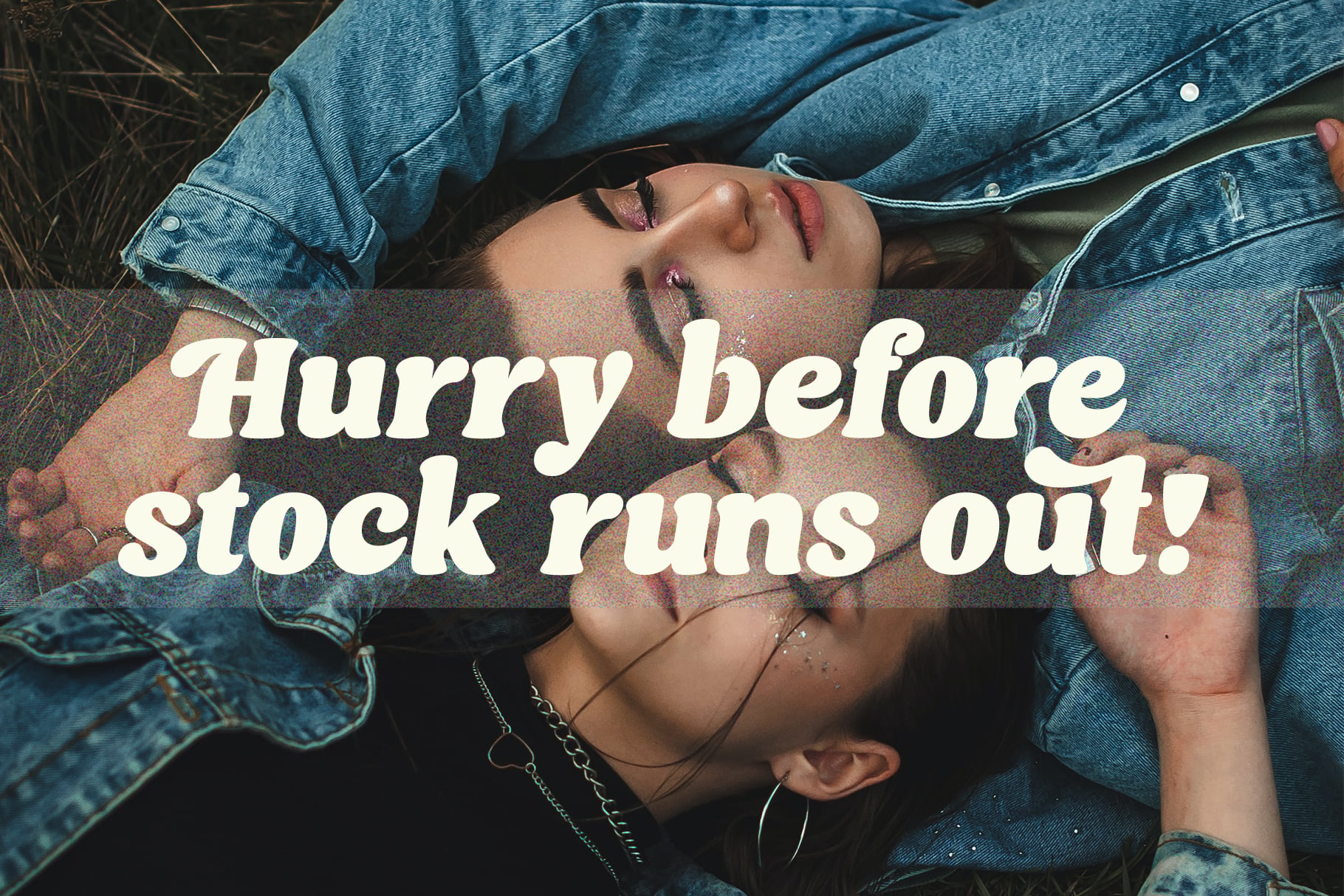 Person lying on dark ground wearing denim jacket with inspirational quote overlay