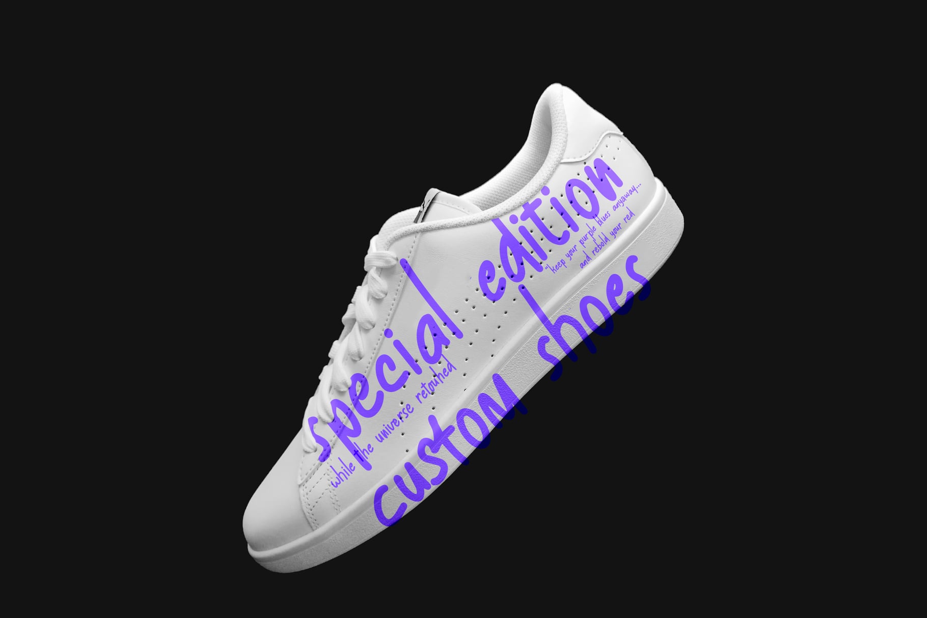 White sneaker with bold purple text wrapping around the shoe on black background