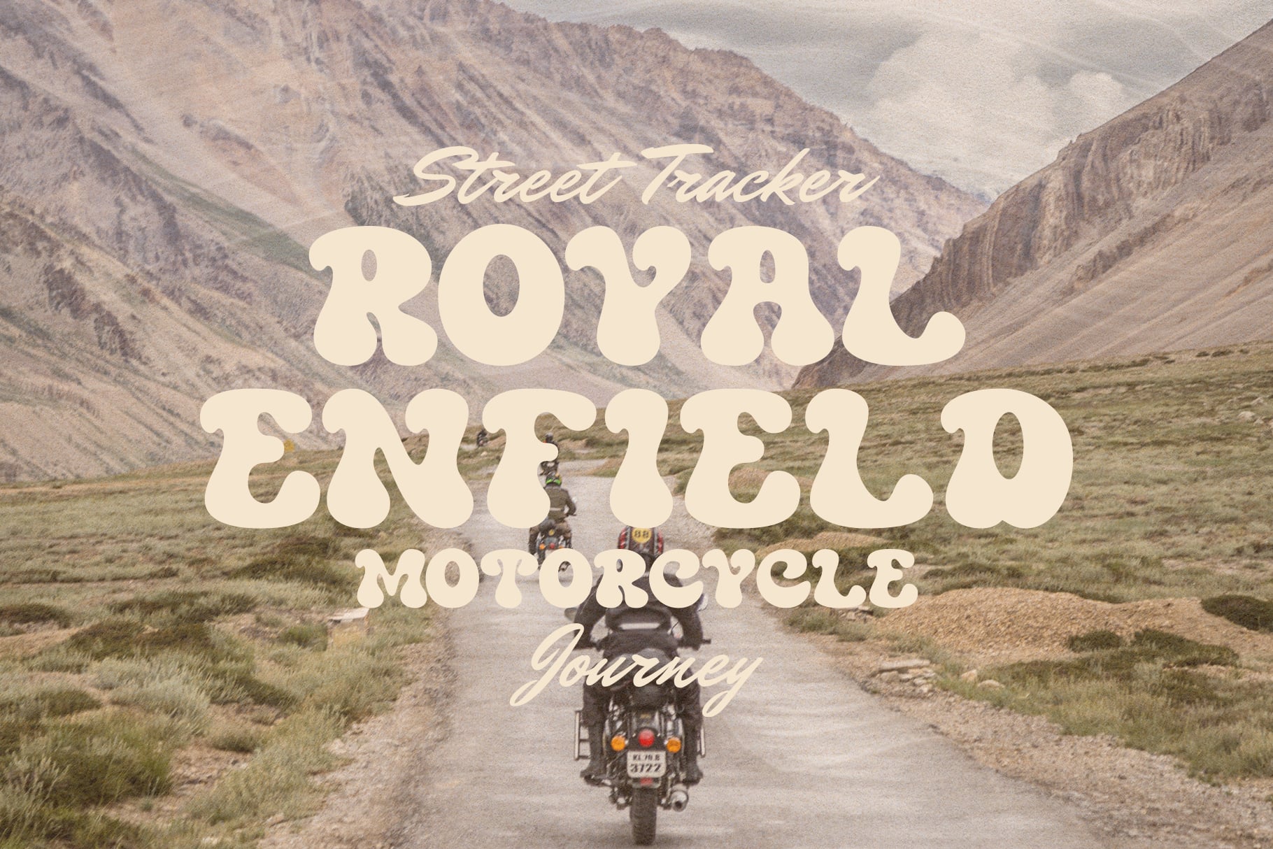 Royal Enfield motorcycle text overlaid on mountain road landscape scene