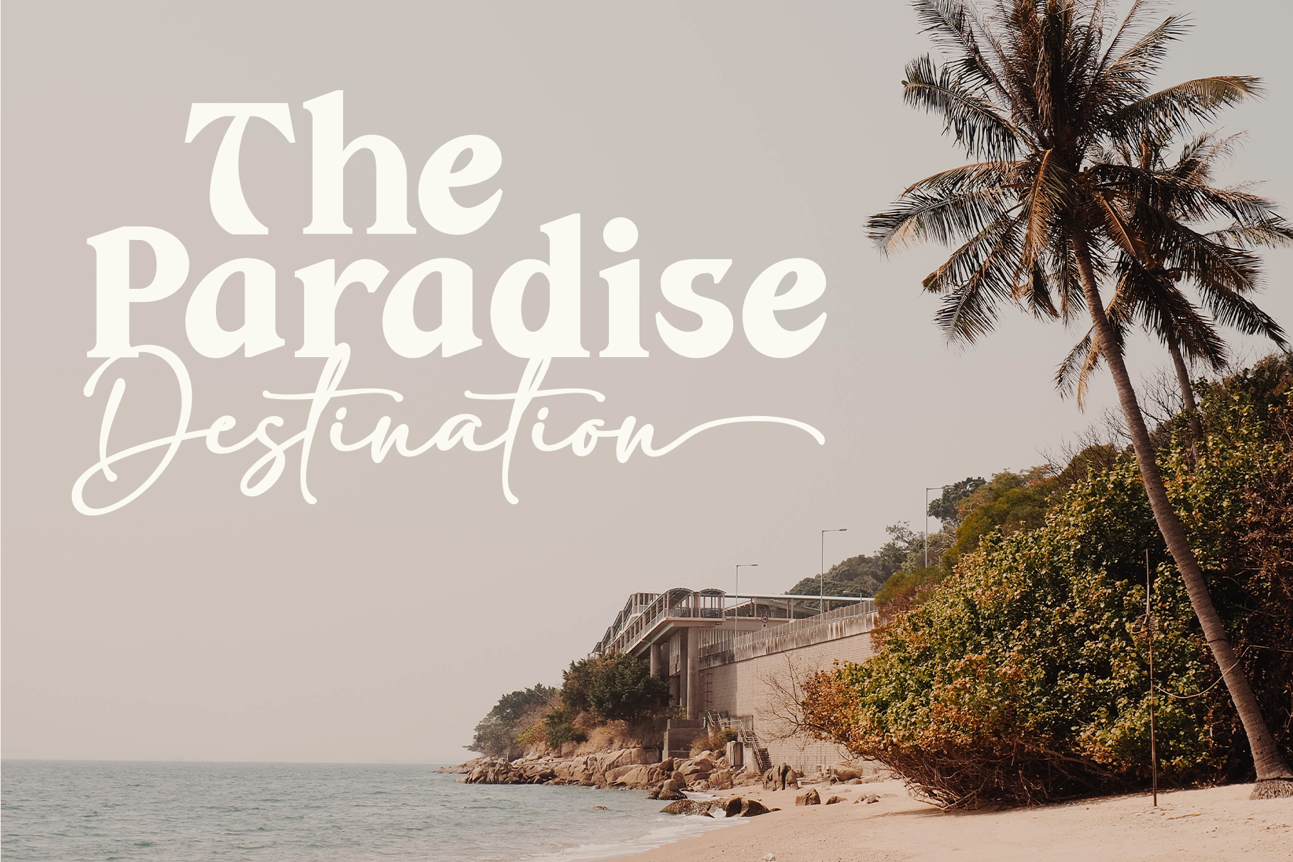 Paradise destination script overlay on tropical beach scene