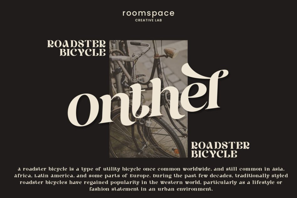 Roomspace Creative Lab layout featuring vintage roadster bicycle with serif typography