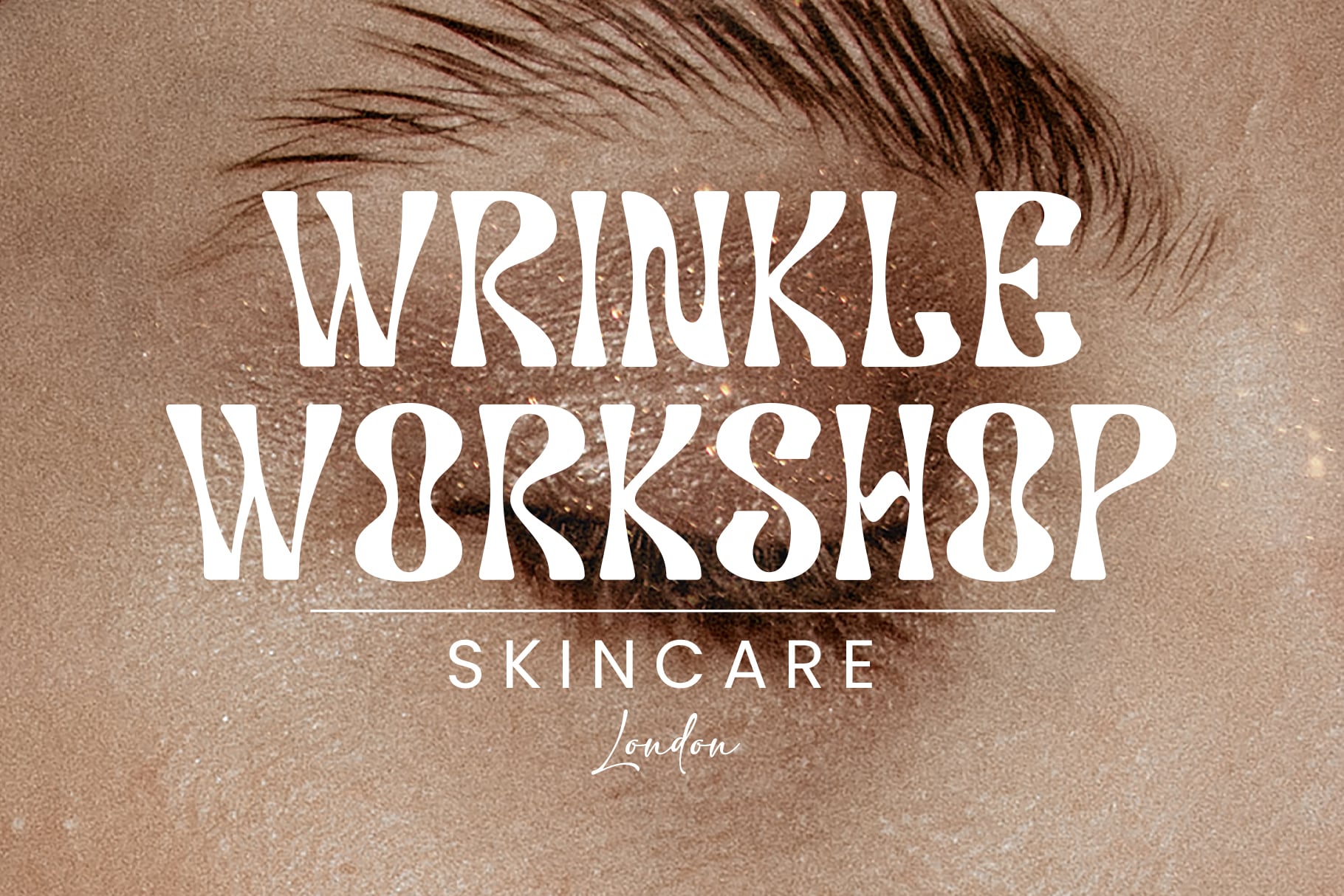 Wrinklee Workshop skincare font over textured face close up