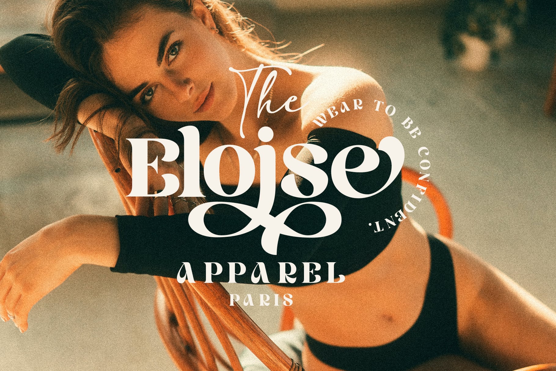Bloise Apparel Paris campaign with woman in orange shirt displaying serif branding