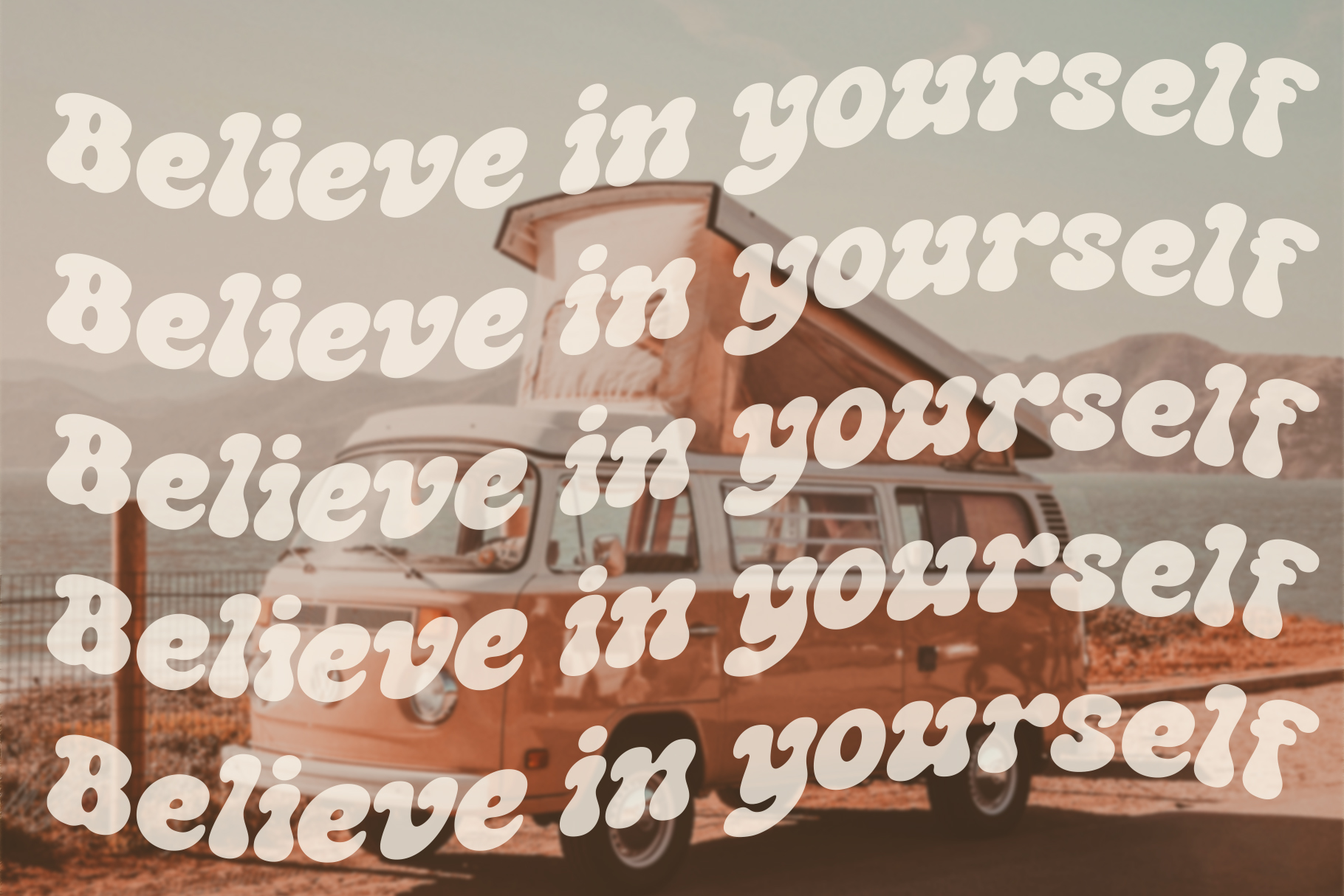 Retro van with pop-up roof against desert landscape overlaid with cream serif text repeating believe in yourself
