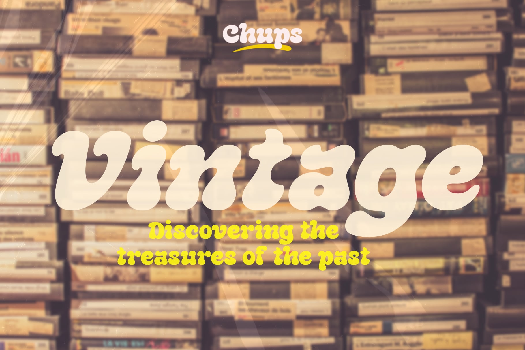 Vintage text overlay on stacked suitcase pile background with Chups logo