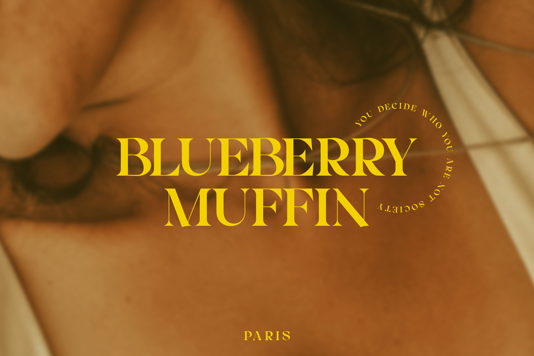 Gold serif text on warm textured background with Paris location label