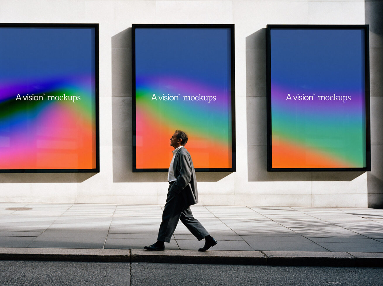 Three framed displays with vibrant gradient showing person walking by