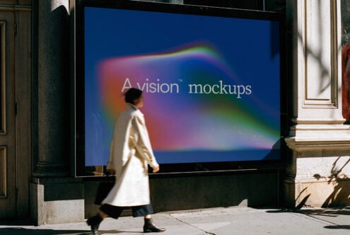 Street-level billboard mockup with vibrant gradient background, person walking by in cream coat