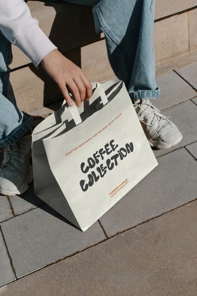 Cream canvas tote with stripe handles displaying Coffee Collection typography