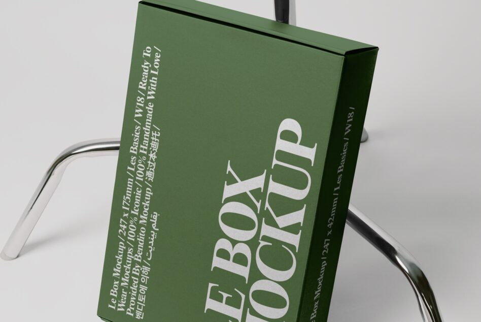 Green box mockup 247x175mm with multilingual text on steel wire display