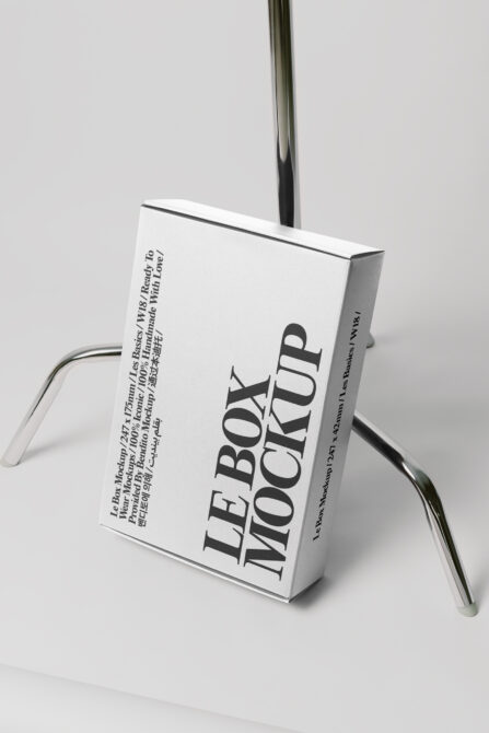 White box mockup 247x175mm hanging on steel wire against white backdrop