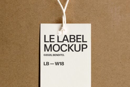 White rectangular hang tag with black text on kraft paper background