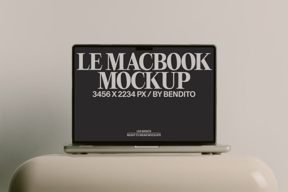 MacBook mockup on cream SMEG appliance with dark screen open