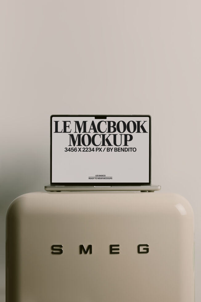 MacBook mockup on cream SMEG appliance showing white screen display