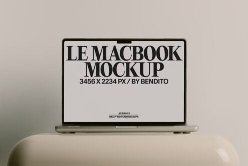 Silver MacBook Pro showing minimalist black text mockup on white screen