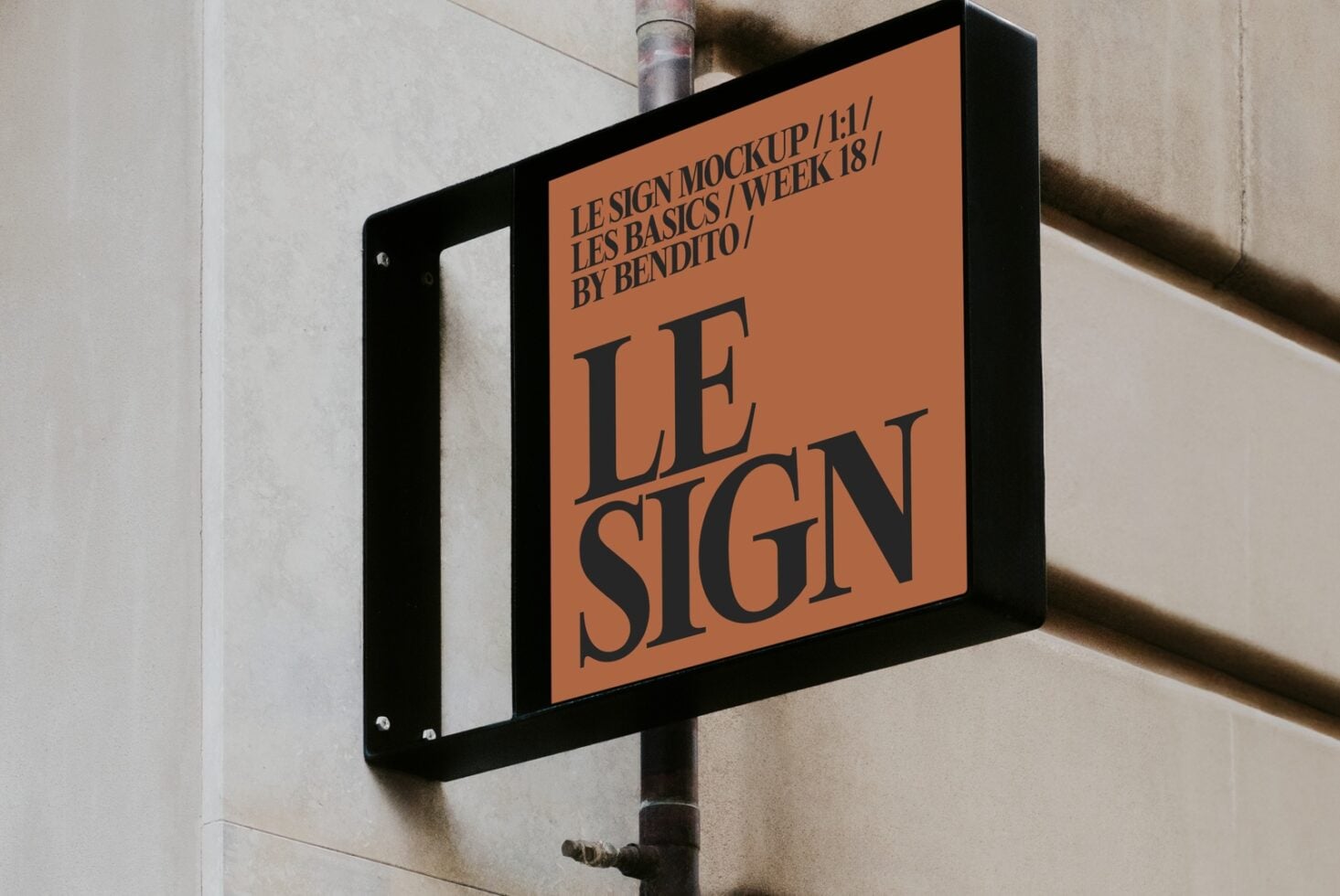 Orange street sign mockup with black frame mounted on beige wall