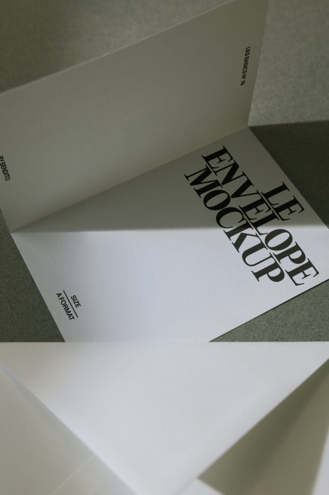 Folded A5 envelope mockup displaying inside spread with stacked text design