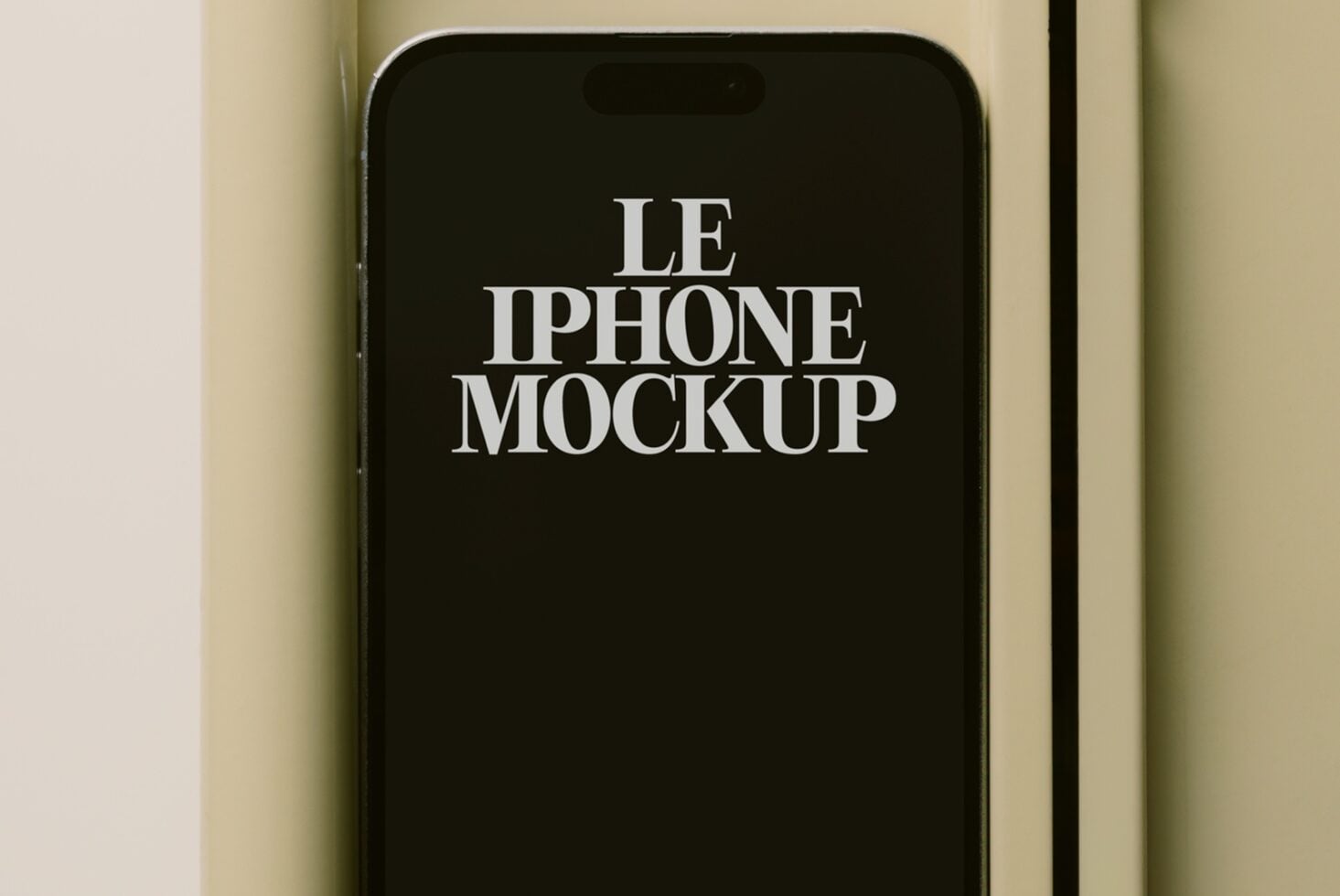 Black iPhone with white screen text reading Le iPhone Mockup