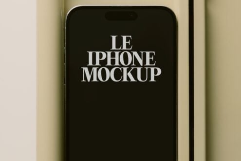Black iPhone with white screen text reading Le iPhone Mockup