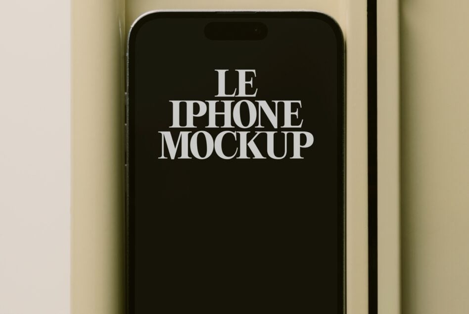 Black iPhone with white screen text reading Le iPhone Mockup