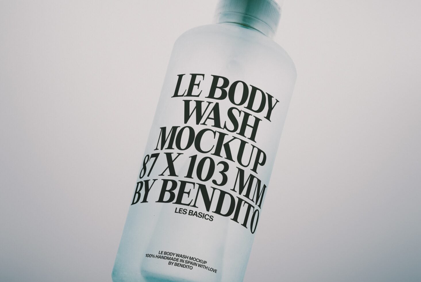 Frosted bottle mockup with bold serif typography showing body wash label design on white background