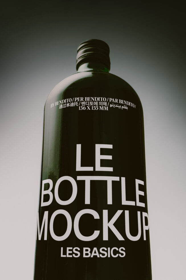 Dark glass bottle mockup with multilingual text overlay on minimal background