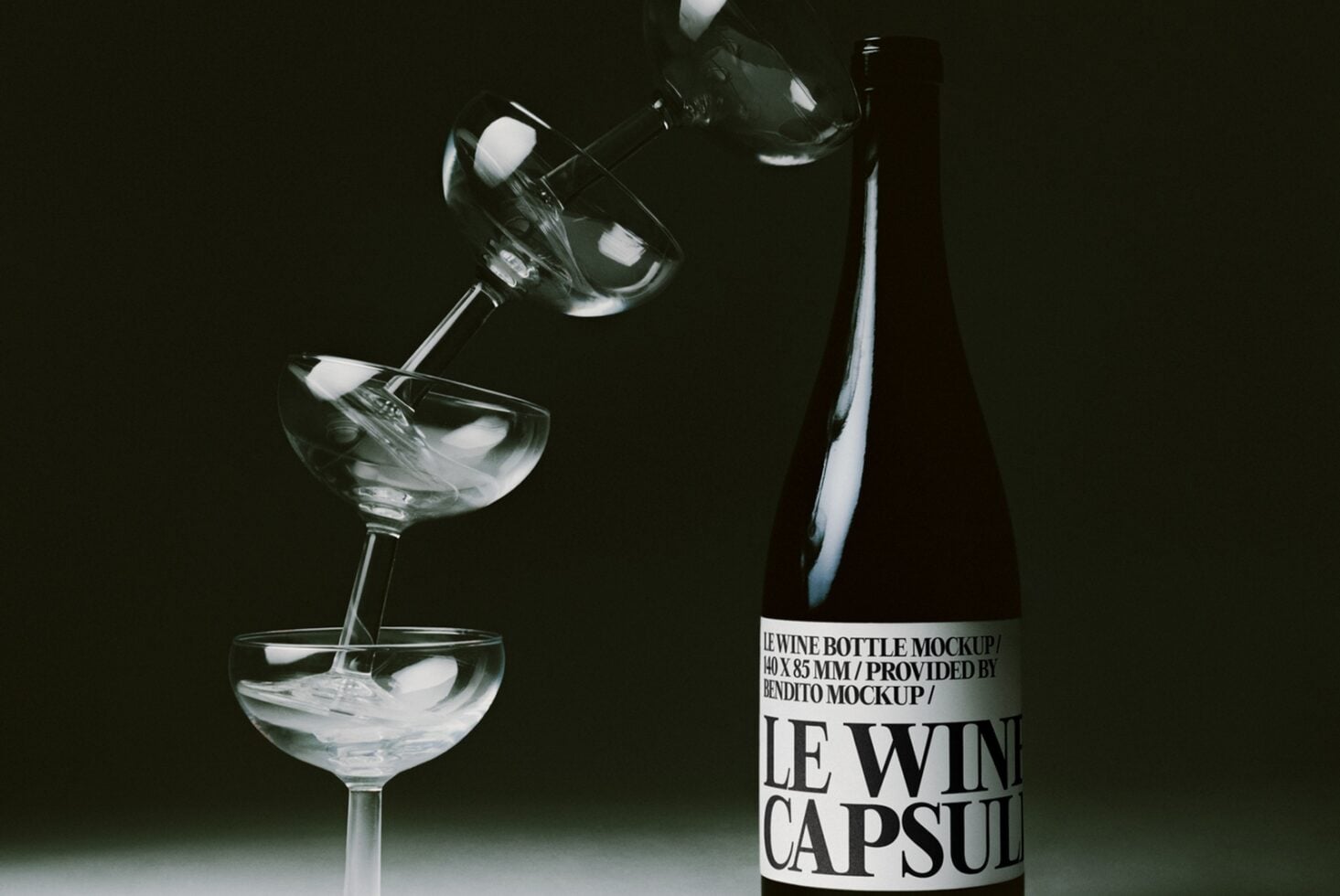 Wine bottle mockup with pouring glass on dark background, ice cubes catching light