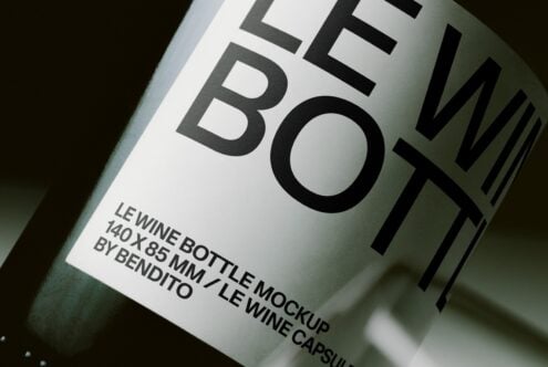 Lewine wine bottle mockup with label showing bold typography on angled glass surface
