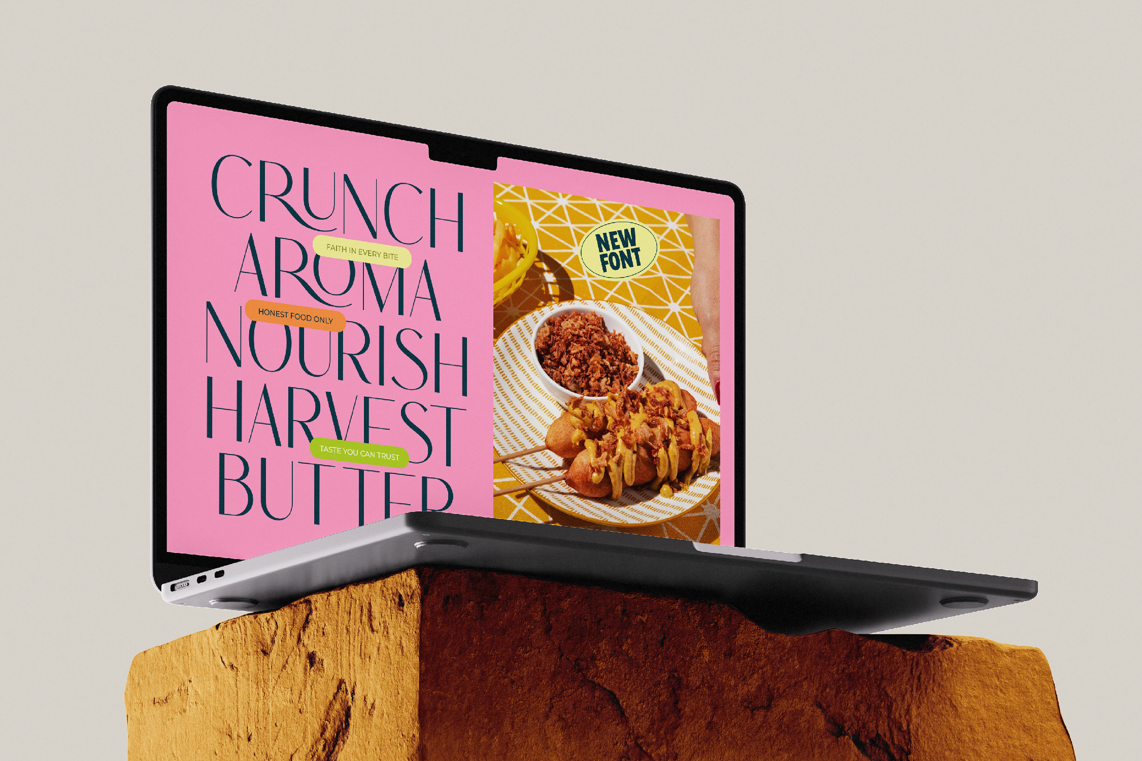 Laptop mockup showing pink design for food brand with seafood imagery on screen