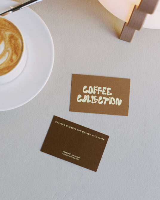 Styled coffee cup latte with business cards brown card cream coffee collection text