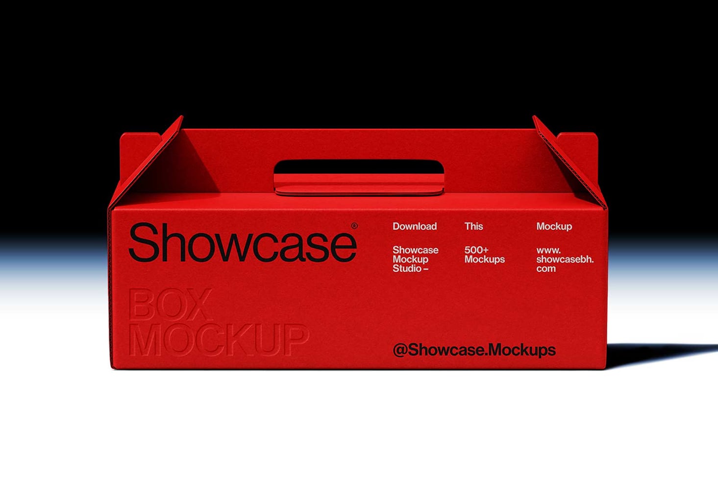 Red cardboard box mockup with carry handles on white surface