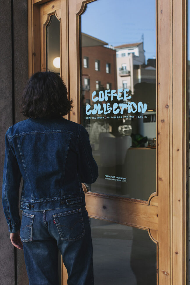 Storefront window decal showing Coffee Collection text, person from behind wearing blue denim jacket