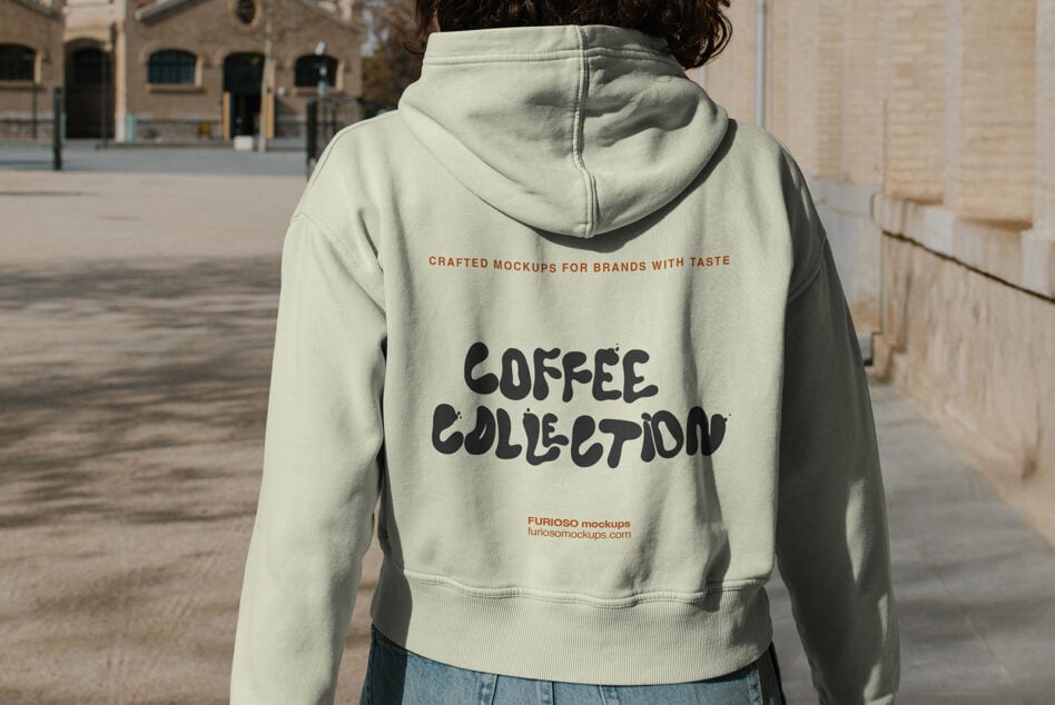 Back view of cream hoodie with Coffee Collection text graphic