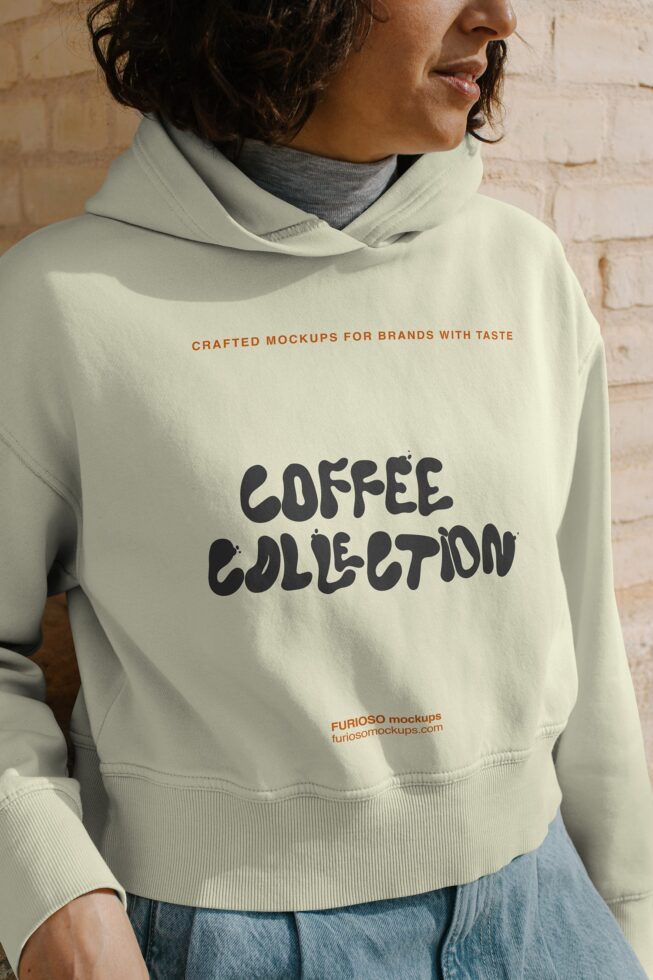 Cream hoodie with Coffee Collection text in black, front view on model